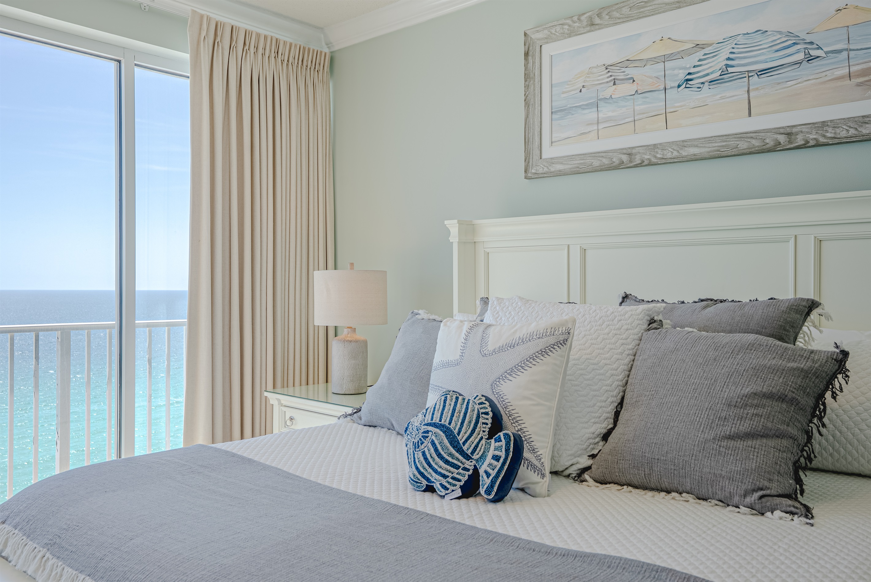 Master bedroom with king bed and beach view and smart TV