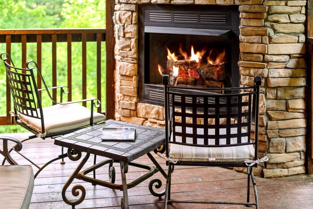 The outdoor fireplace makes for a lovely relaxing spot.