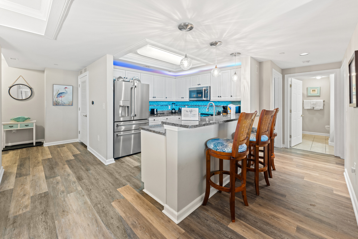 Breakfast bar off kitchen with more seating