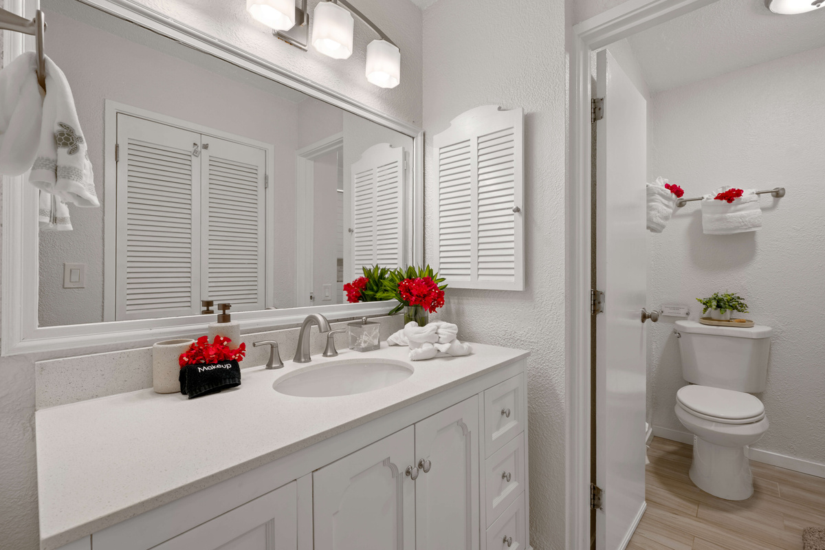 Modern white finishes create a clean, relaxing atmosphere.