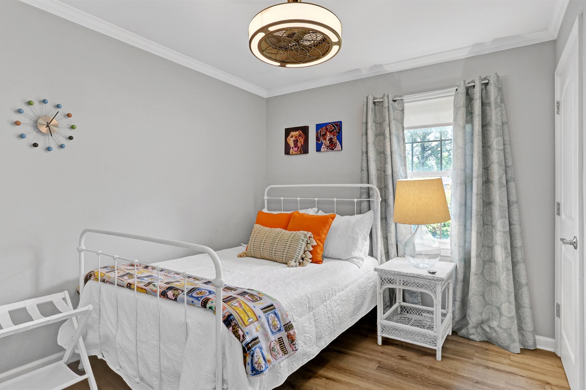 Vibrant and inviting—this cheerful bedroom features a comfy double bed and playful pops of color for a fun, feel-good stay.