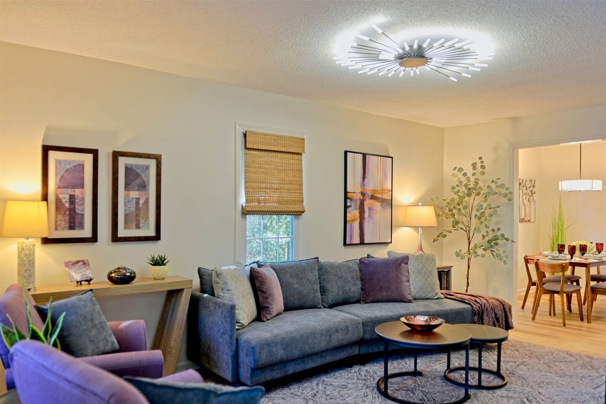 As you enter the home, you are greeted by the beautifully decorated living room with plenty of seating.