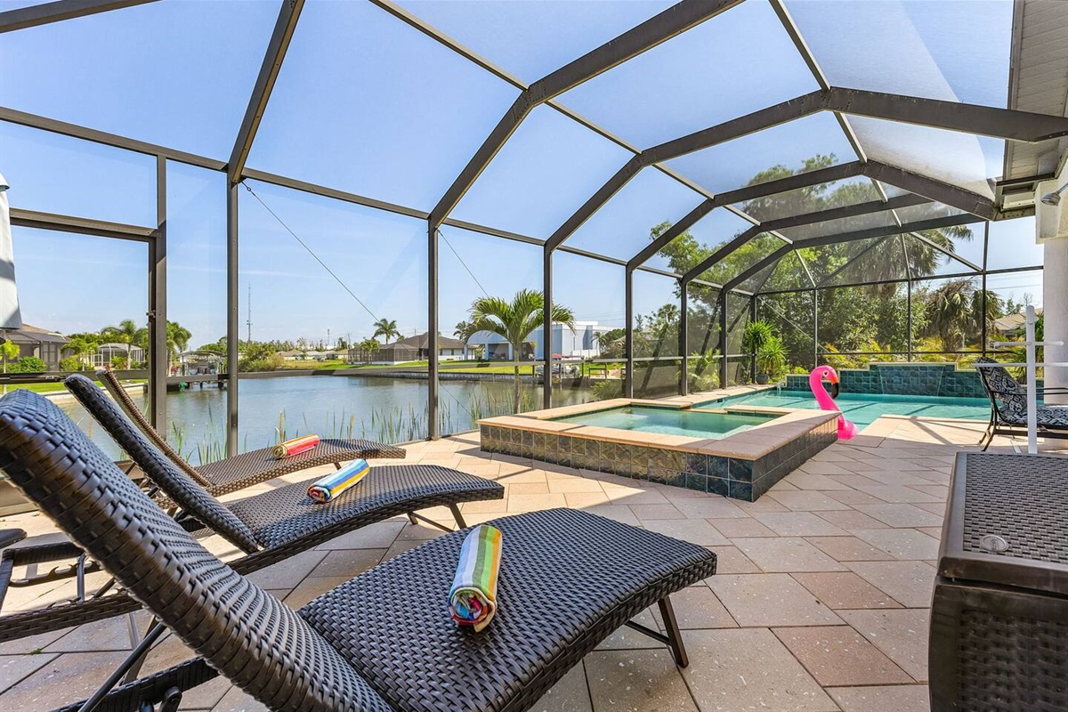 Relax and soak up the sun in the spacious lounging area with a refreshing spa!