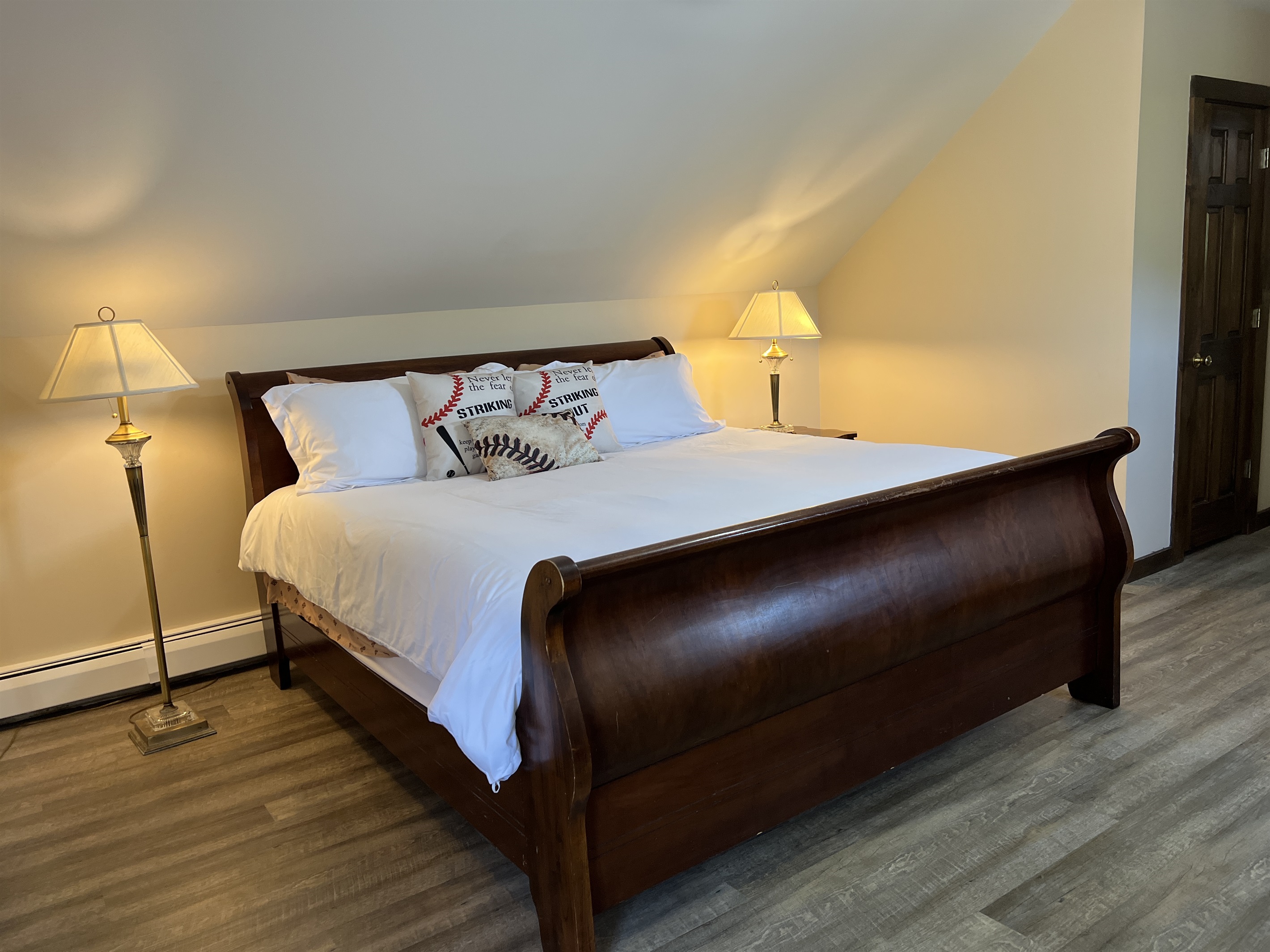 Roundtripper 2nd floor King bedroom with beautifully gracious sleigh bed.