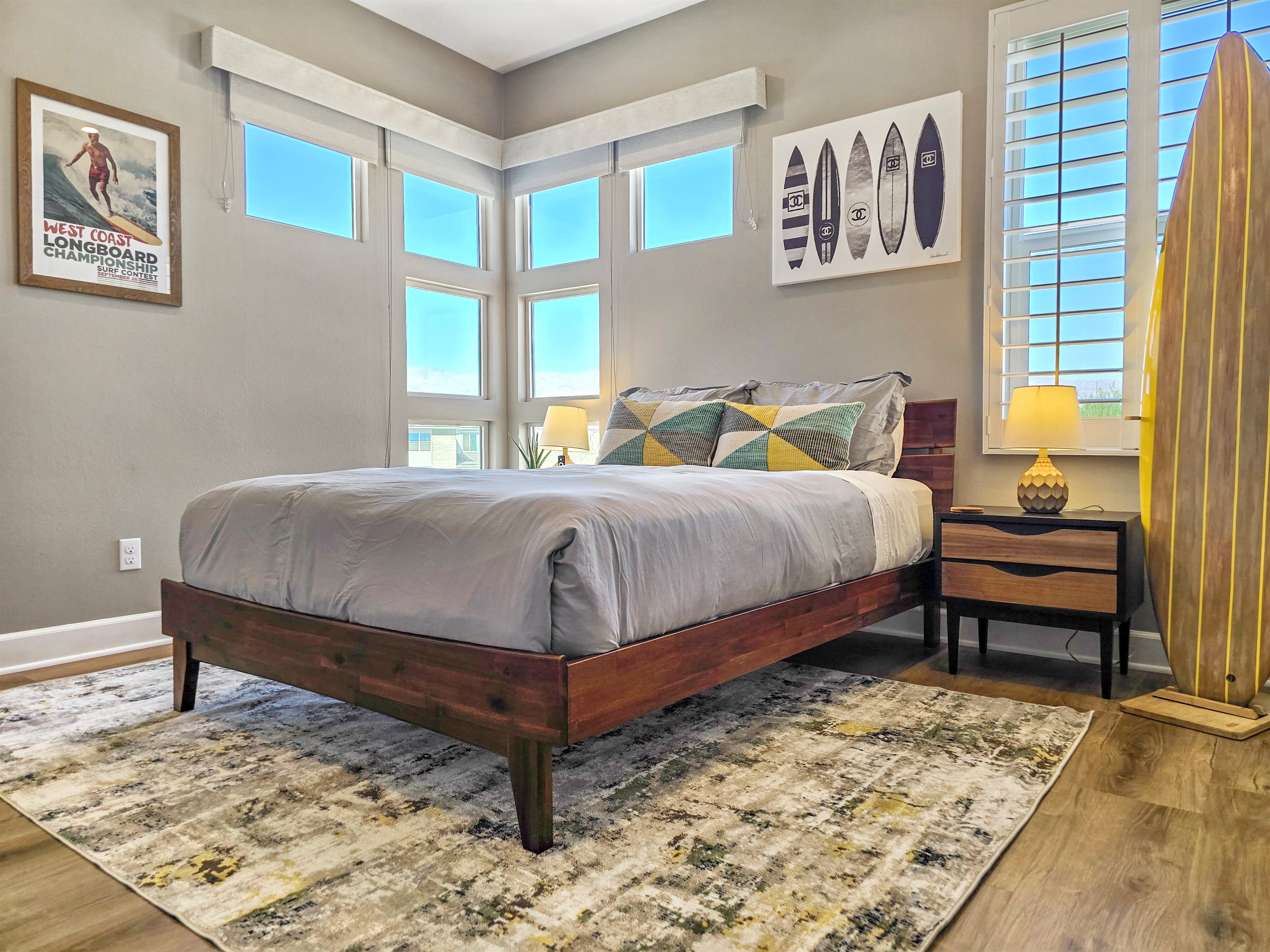 Bedroom #3 features a queen-sized bed, lake views, ceiling fan, smart TV, closet and an ensuite bathroom with walk-in shower. (Sleeps 2)
