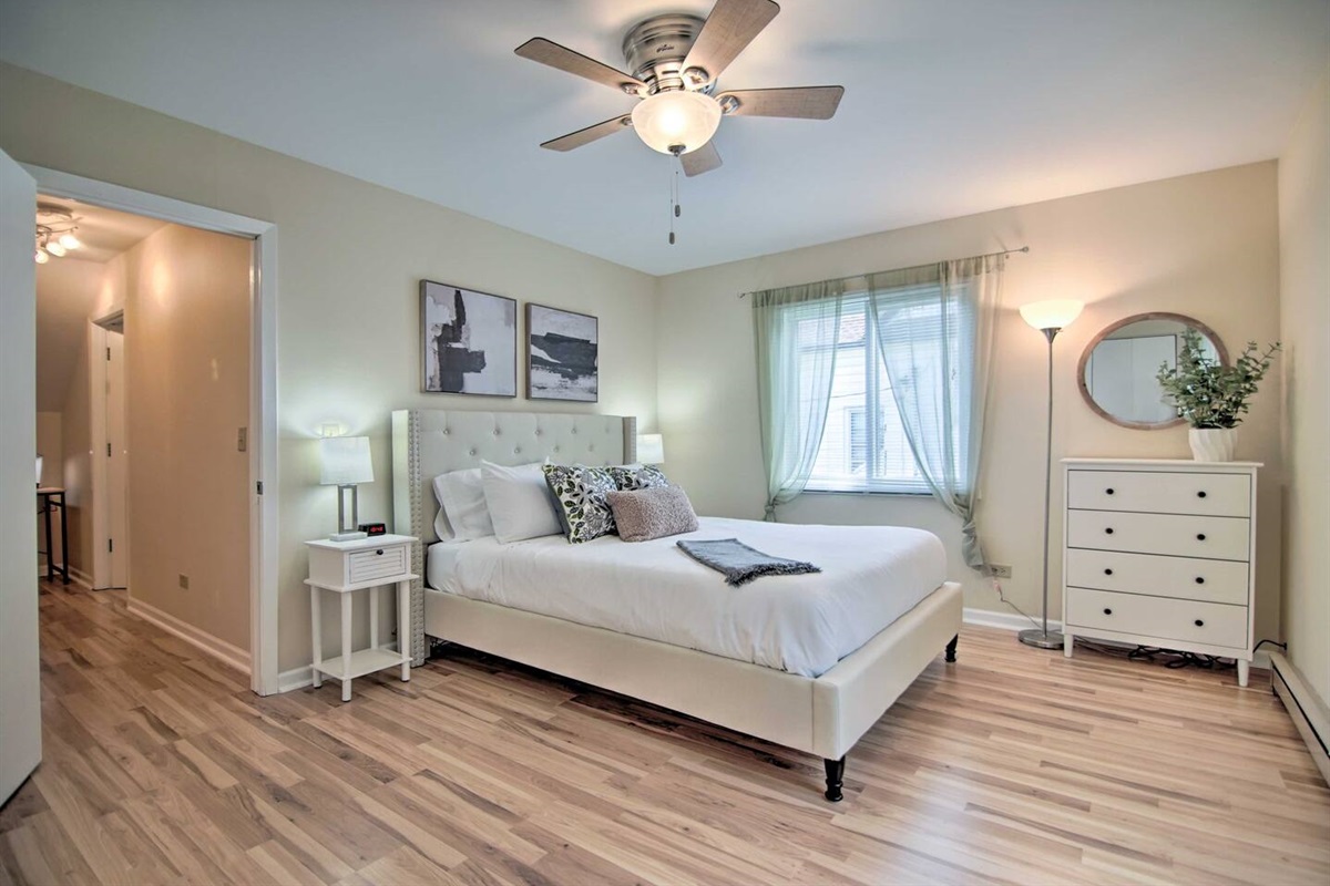 The modern, spacious master bedroom has a queen size bed and is a quiet sanctuary to rest and relax after all your travels and day trips.