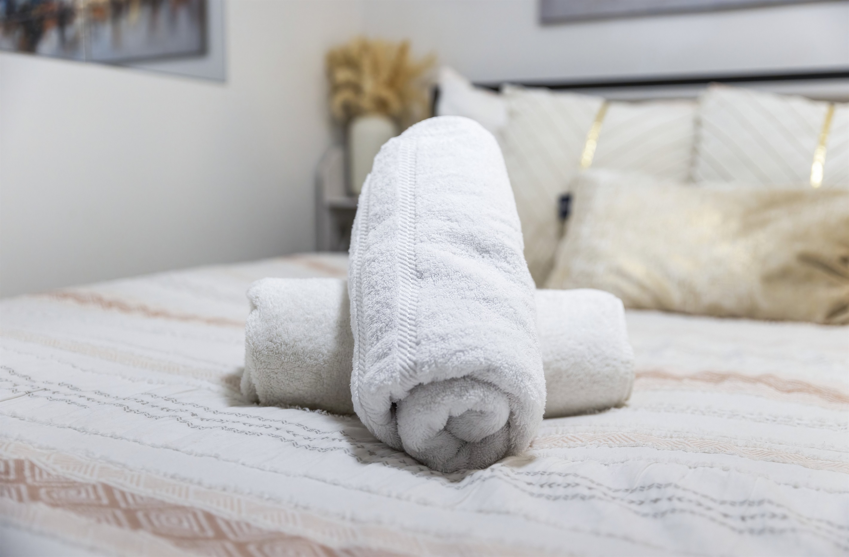 Arrive to freshly rolled spa soft towels that instantly set the tone for a comfortable, well cared for stay.