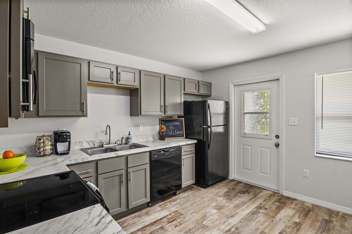 Unit #2 Right: Kitchen connects to the Backyard door.