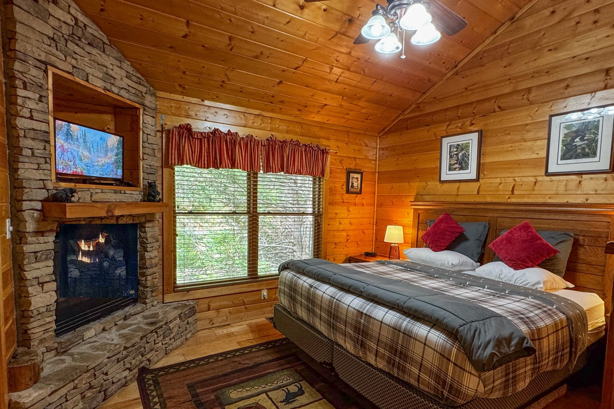 Relax at night with the cozy, romantic ambience of the gas fireplace in the Master bedroom with a king-size bed! The satellite TV has hundreds of options for entertainment.