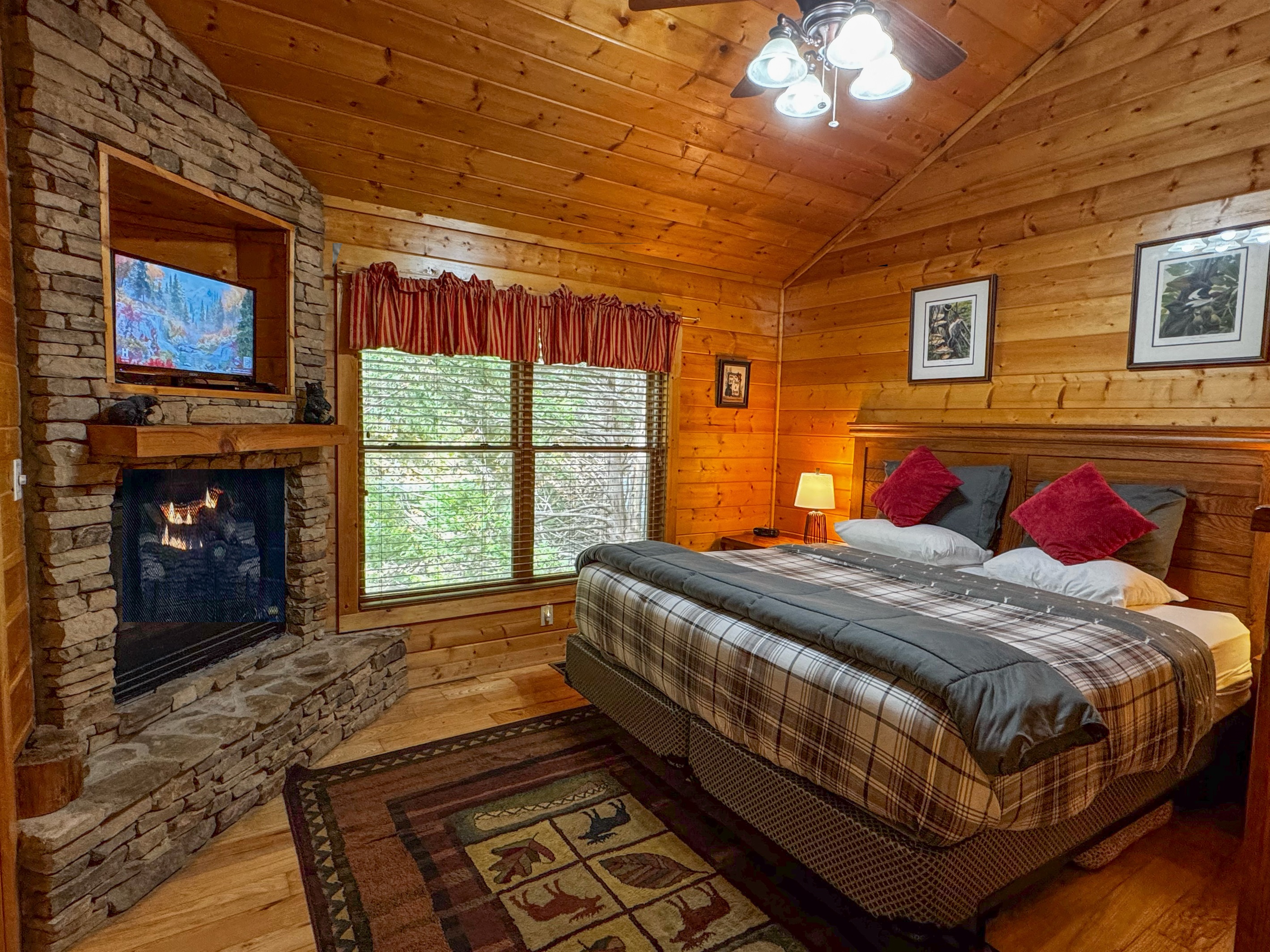 Relax at night with the cozy, romantic ambience of the gas fireplace in the Master bedroom with a king-size bed! The satellite TV has hundreds of options for entertainment.