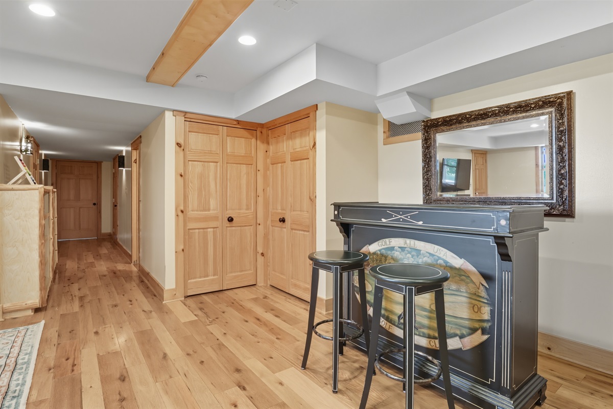 Lower-level entry with custom wood finishes.
