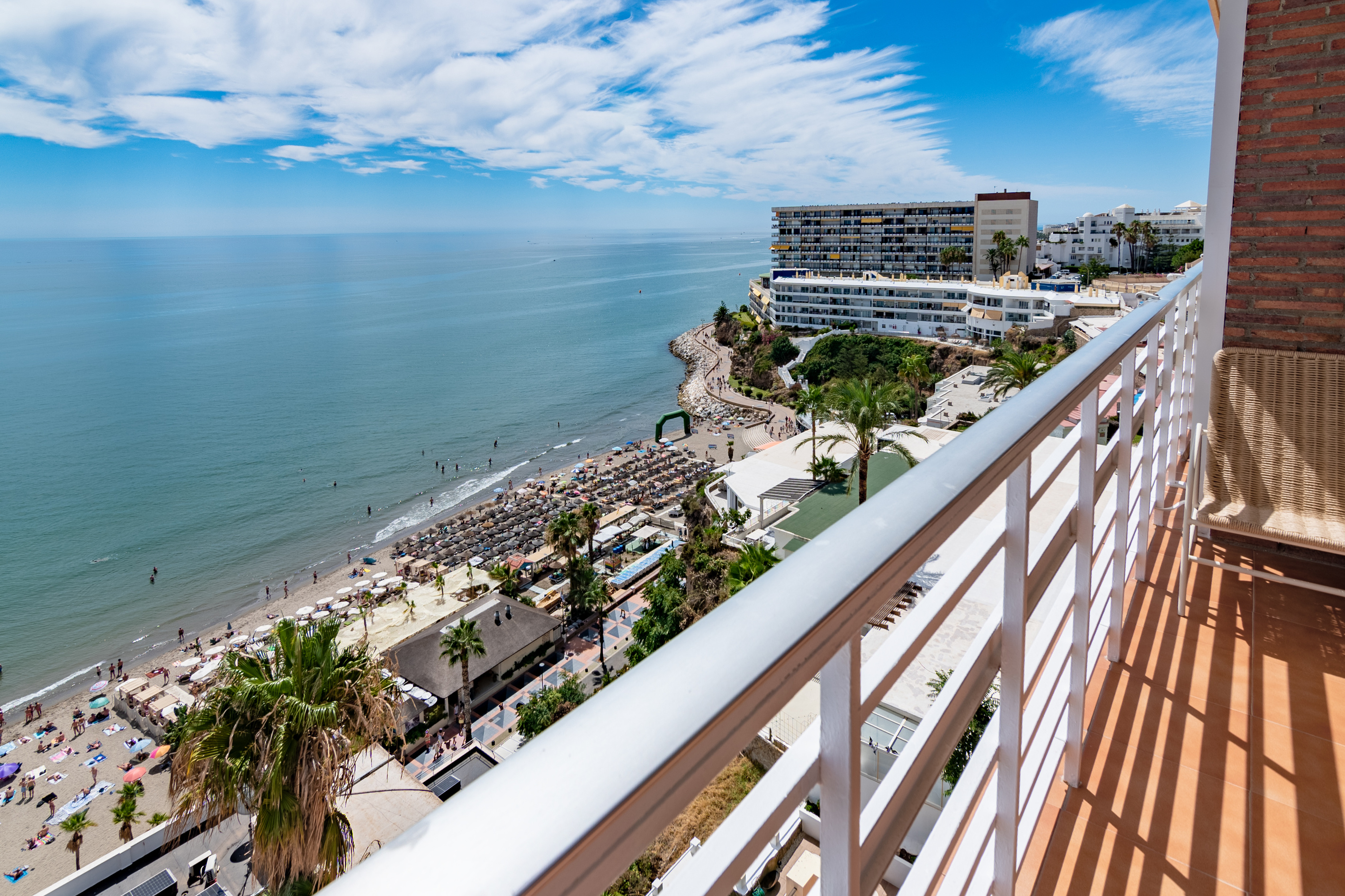 The beach and promenade are right below the residence