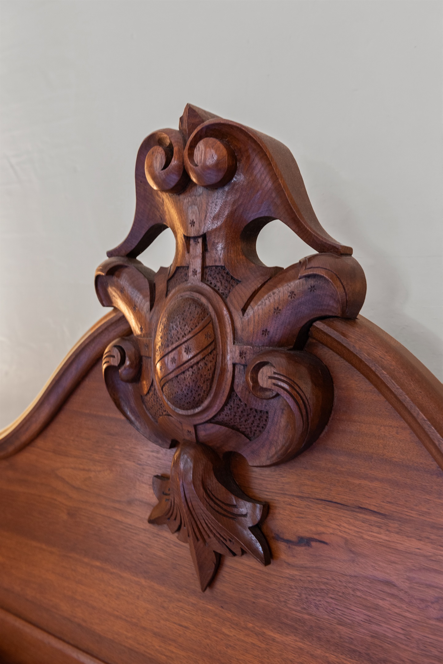 Intricate antique wood carving showcasing detailed craftsmanship
