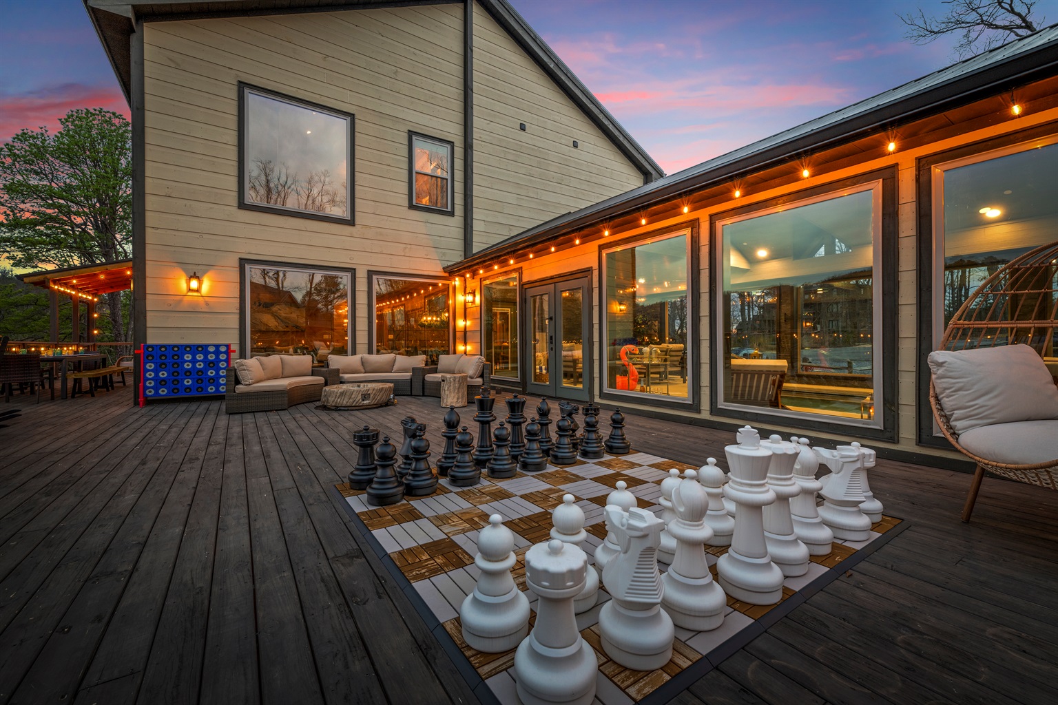 Challenge friends to giant chess or Connect 4 on the deck, then gather around the nearby conversation set for firepit nights and s’mores while watching stunning sunsets over the Smoky Mountains.
