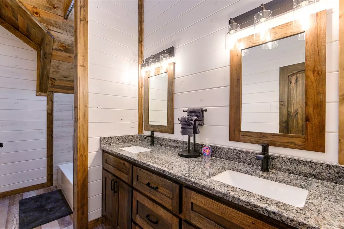 Bright, modern, and elegant — each bathroom is a blend of spa-like comfort and cabin charm.