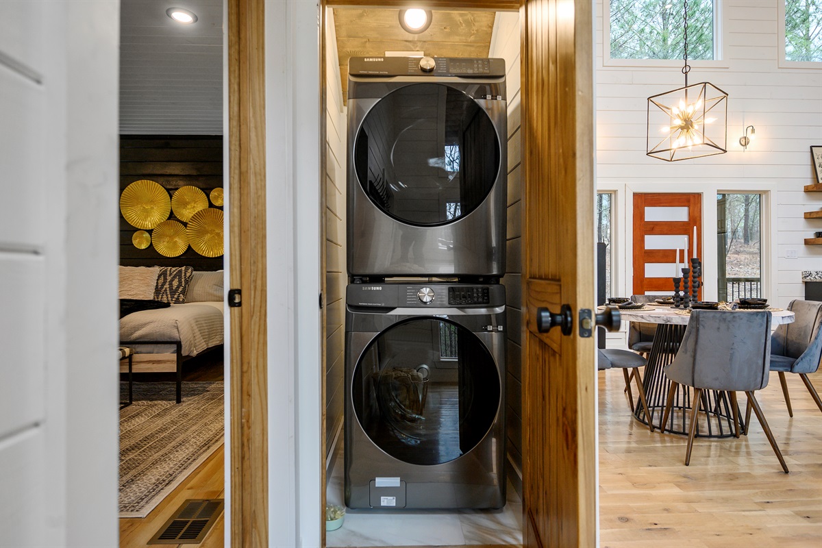 A convenient laundry setup with washer and dryer, making it easy to freshen up clothes during your stay. ✨