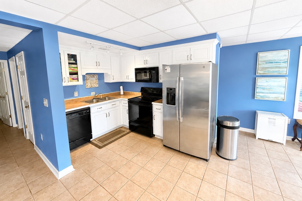 Cozy kitchen with modern appliances and cabinetry