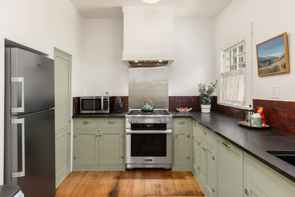 new kitchen cabinets, new appliances with vintage feel. Miele stove and dishwasher