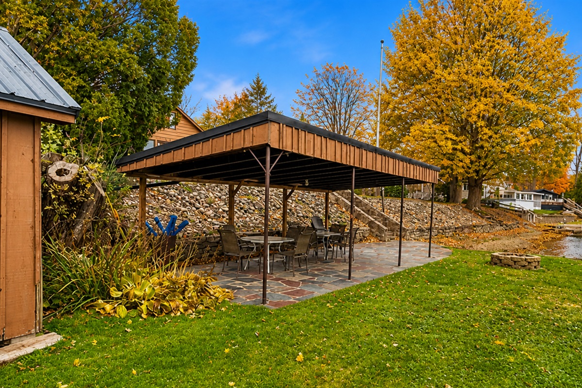 Lakeside canopy with outdoor dining area