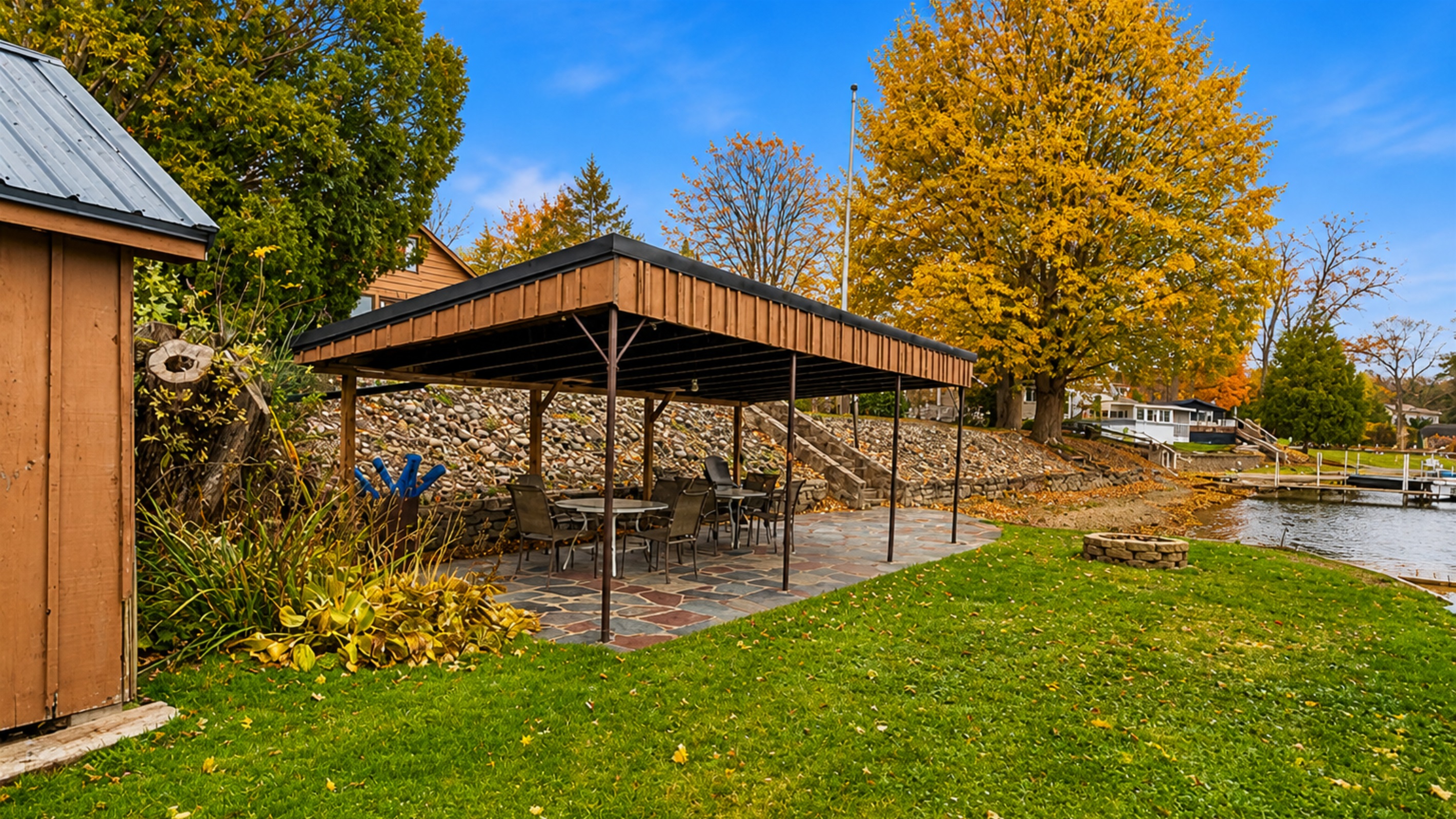 Lakeside canopy with outdoor dining area