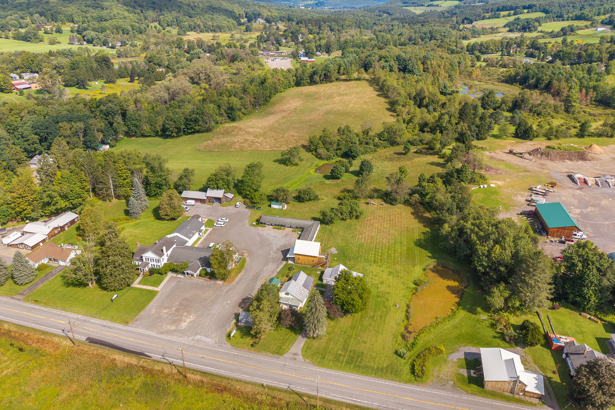 A sweeping view of the grounds and surrounding Fly Creek landscape.