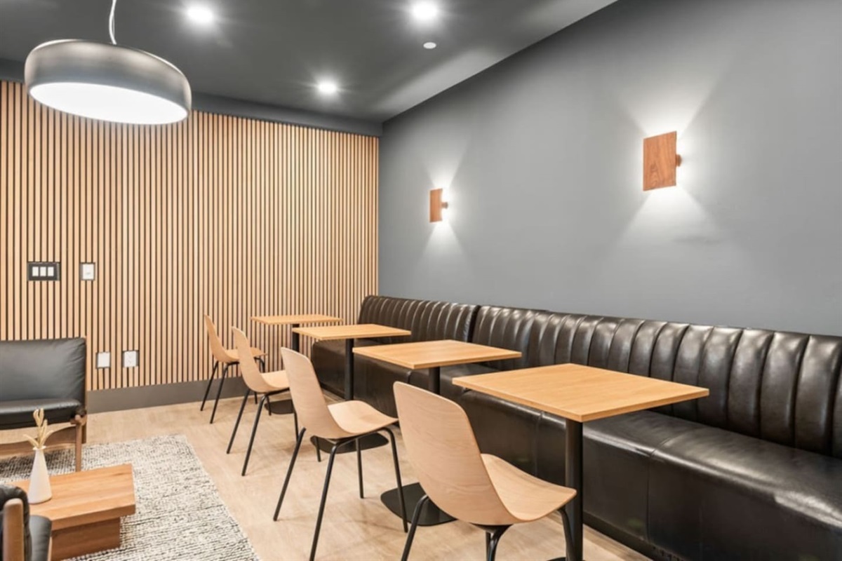 Building lounge and workspace area.  Get some work done on the go or just take a quiet minute inside from the pool - public area in the building and guests are encouraged to use during their stay with us!