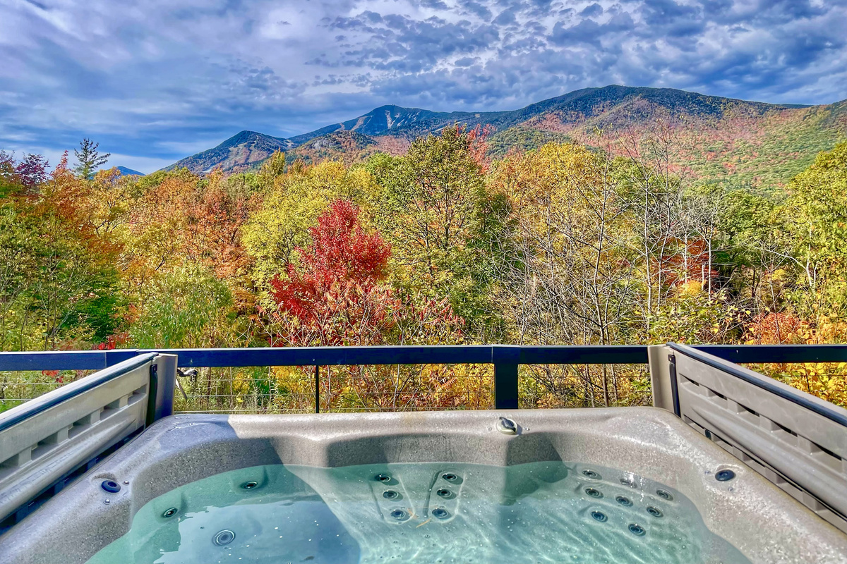 Luxuriate in our sumptuous hot tub overlooking the mountains.
