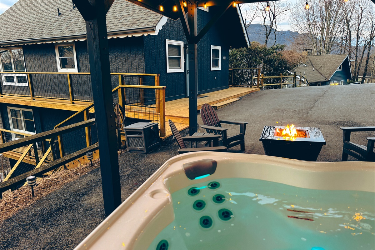 Patio w/ Views: Dining for 6, Big Premium Hot Tub, Fire Pit Table w/ Polywood Adirondack Chairs, a Hammock, extra seating & Outdoor Games. Formerly our carport - there's still room to park 4 cars