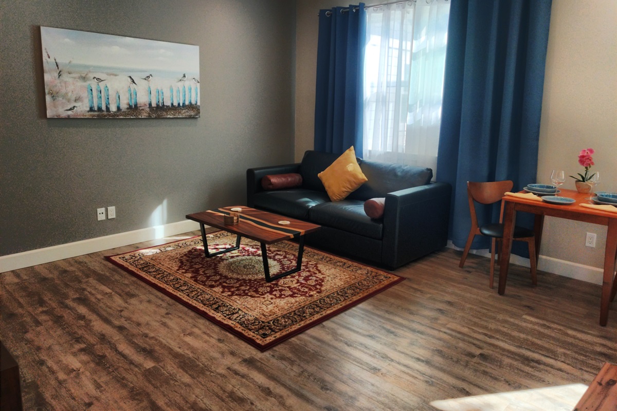 Fold out queen sized bed in couch. Thinner mattress good for children or lighter people, but does have the comfort of wood slats for head and torso area.