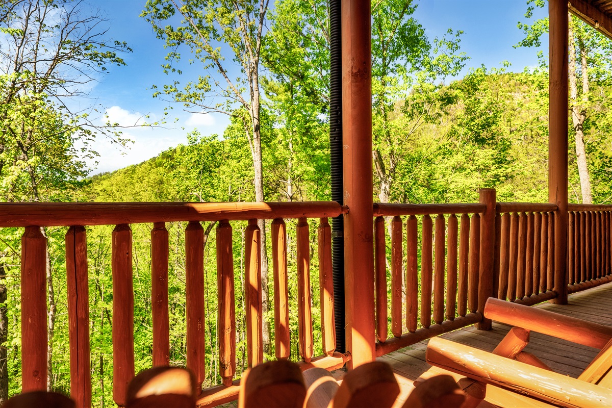 The deck is a beautiful spot for a moment of relaxation in the natural beauty.