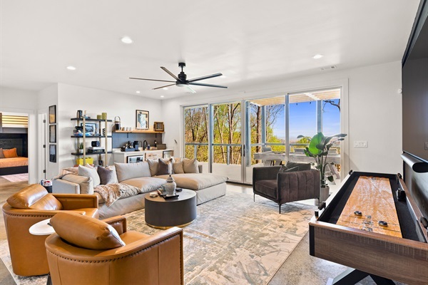 Plush lounging and panoramic views make this space a cozy nook to unwind or entertain.