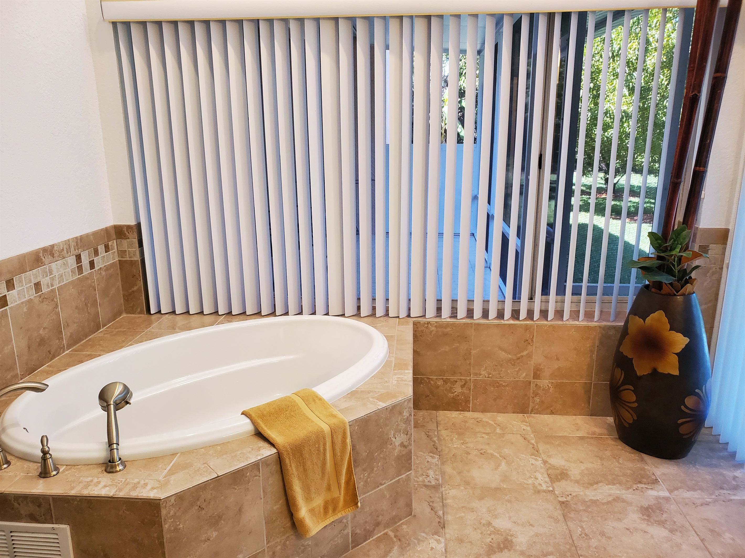 Sunk-in tub in private Master Queen bathroom