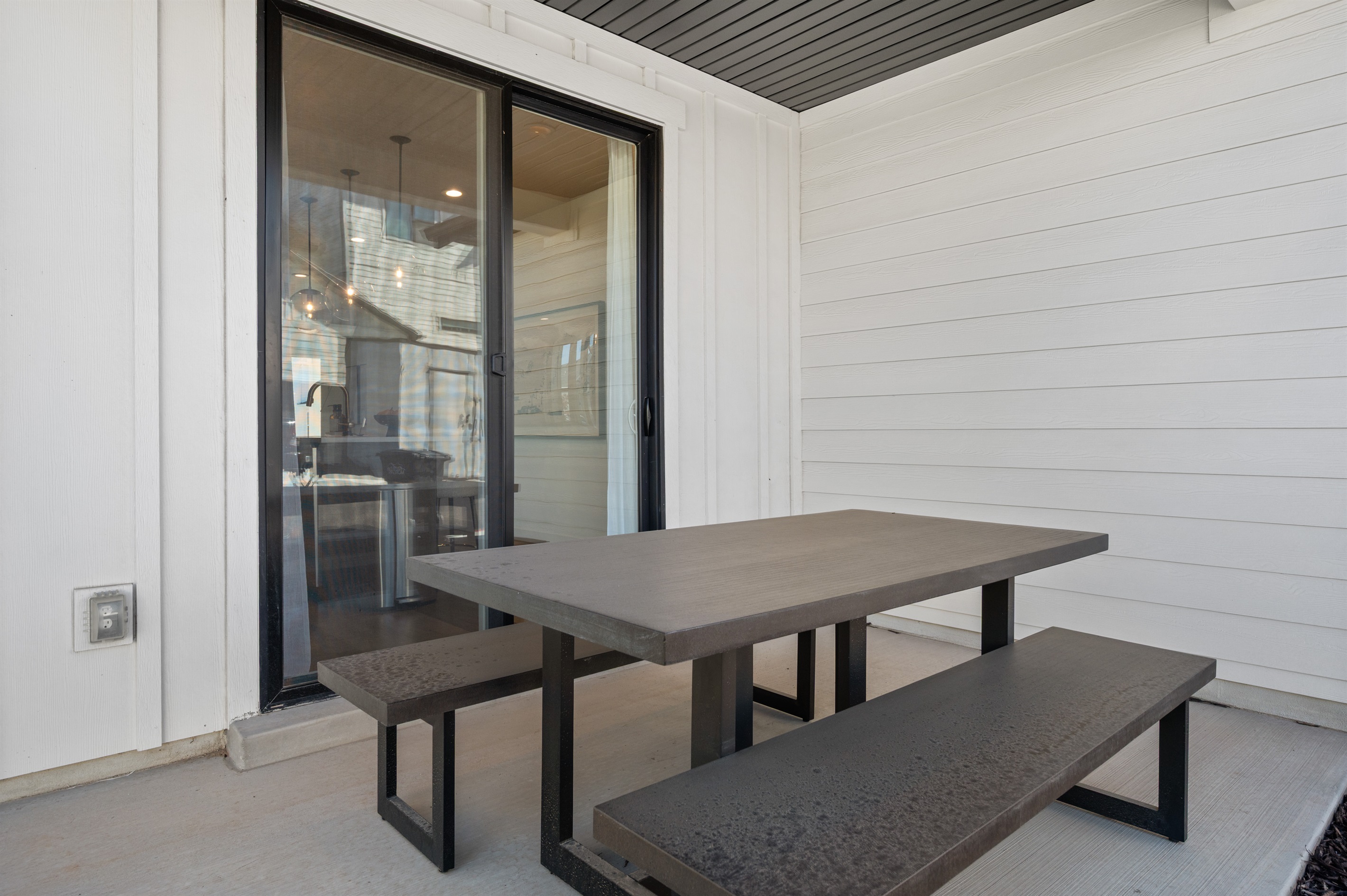 Step outside for fresh air and al fresco dining right off the main living space.
