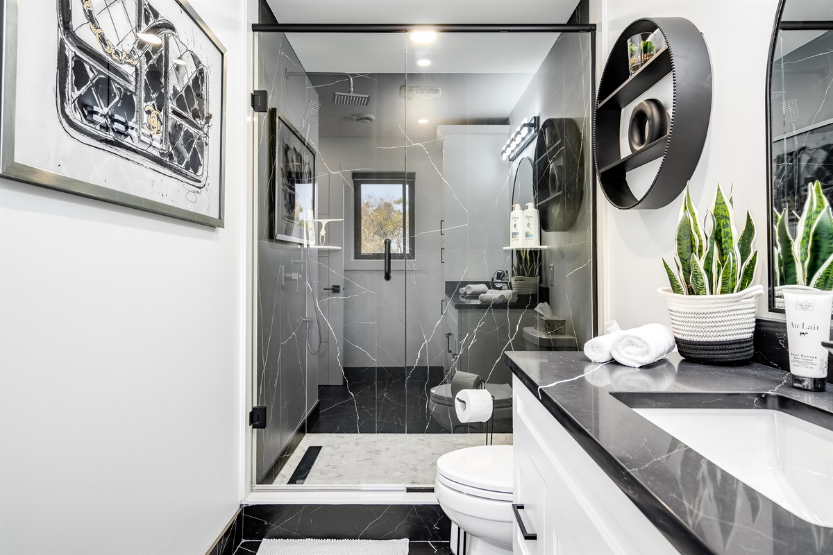 Full Bathroom Warm accent lighting highlights architectural details.