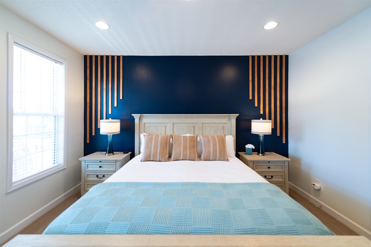 [Master Bedroom] Escape to the serenity and luxury of our exquisitely furnished master bedroom. Your private haven awaits, enveloping you in comfort and tranquility. Get a good night's rest or sit up and relish the night sky with a loved one on the porch! 