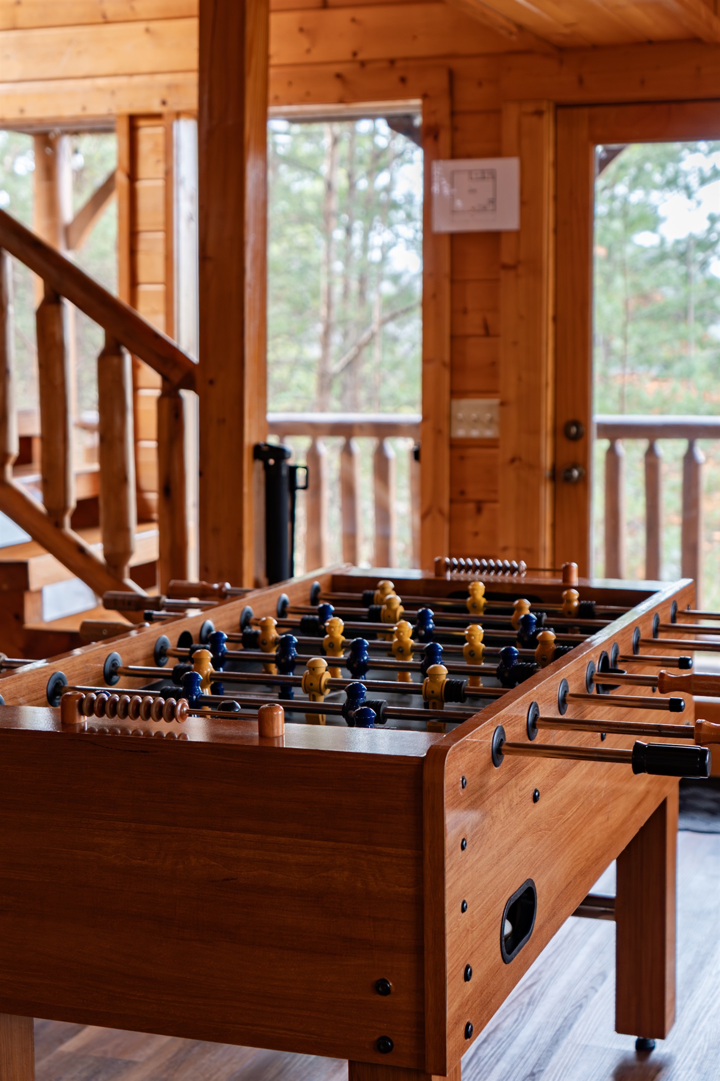 Full-size foosball table — the tournament starts the first night and the trash talk doesn't stop until checkout.