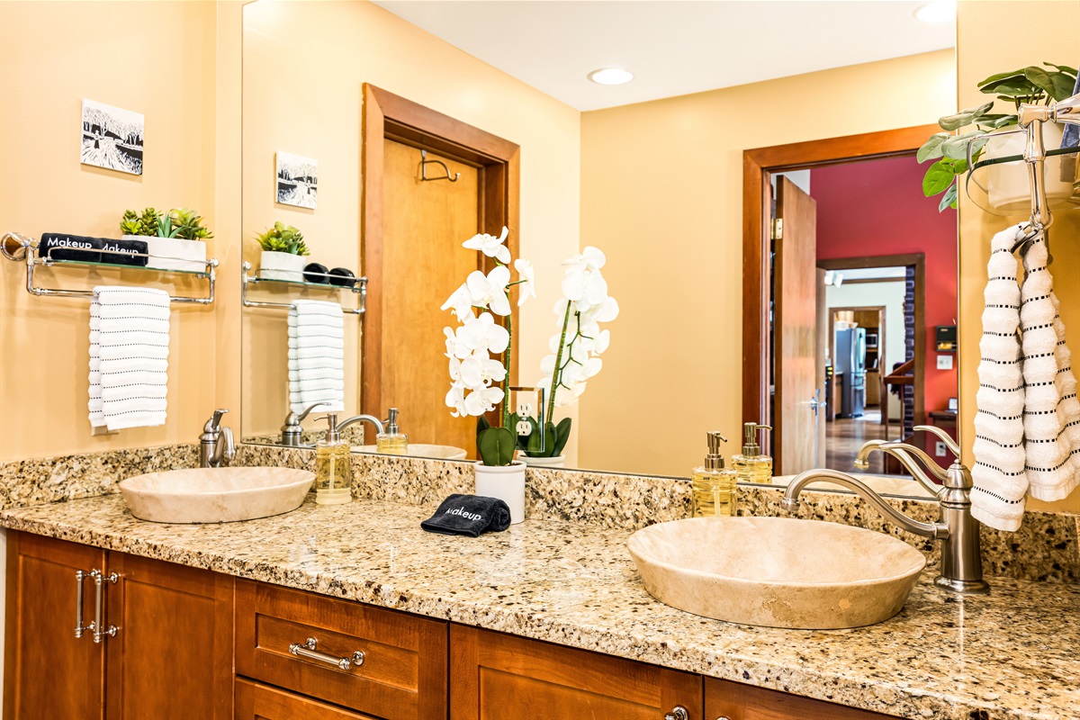 Mountain View's beautiful en-suite bathroom with two sinks, many drawers, and plenty of 'stuff storage'.