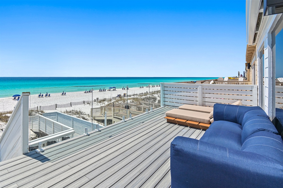 Green Reef 1 - Comfortable Patio furniture and glass railings on the 2nd level to maximize those Gulf and Beach views - Perfect for morning coffee or a cold afternoon beverage!
