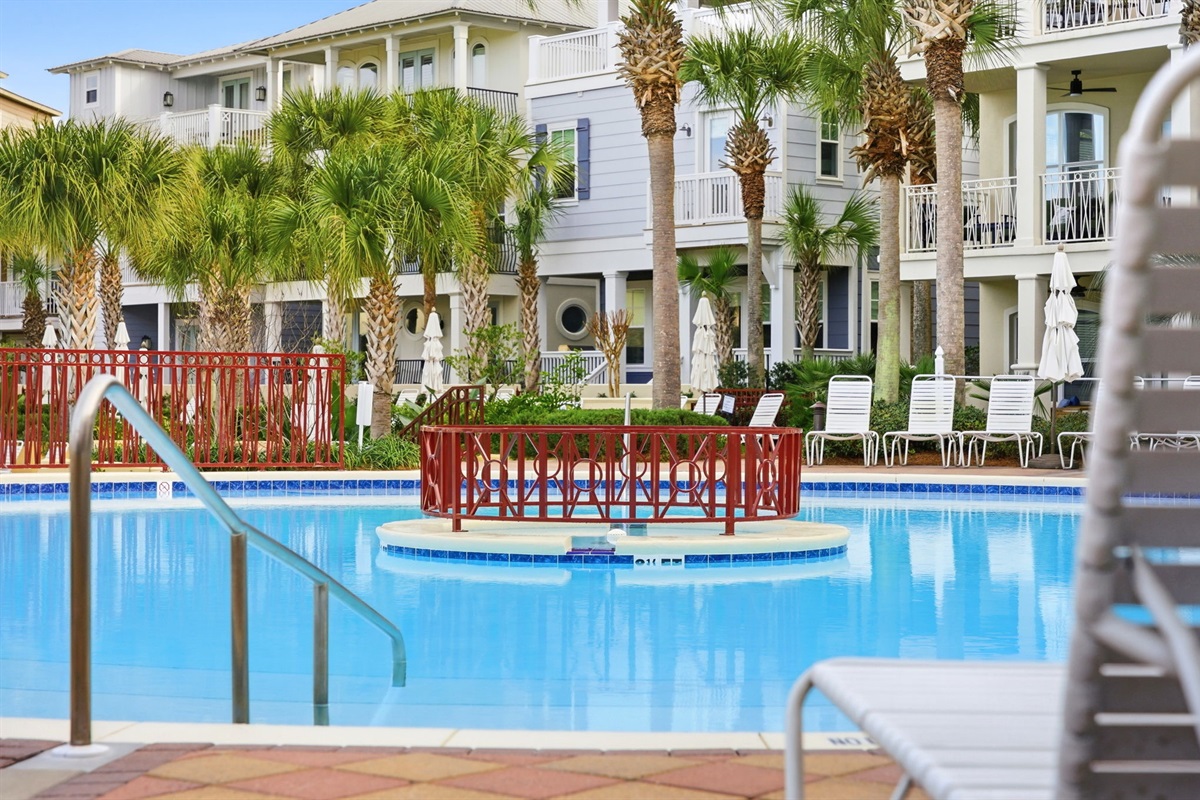 Poolside perfection: where crystal clear water meets sunshine and serenity.