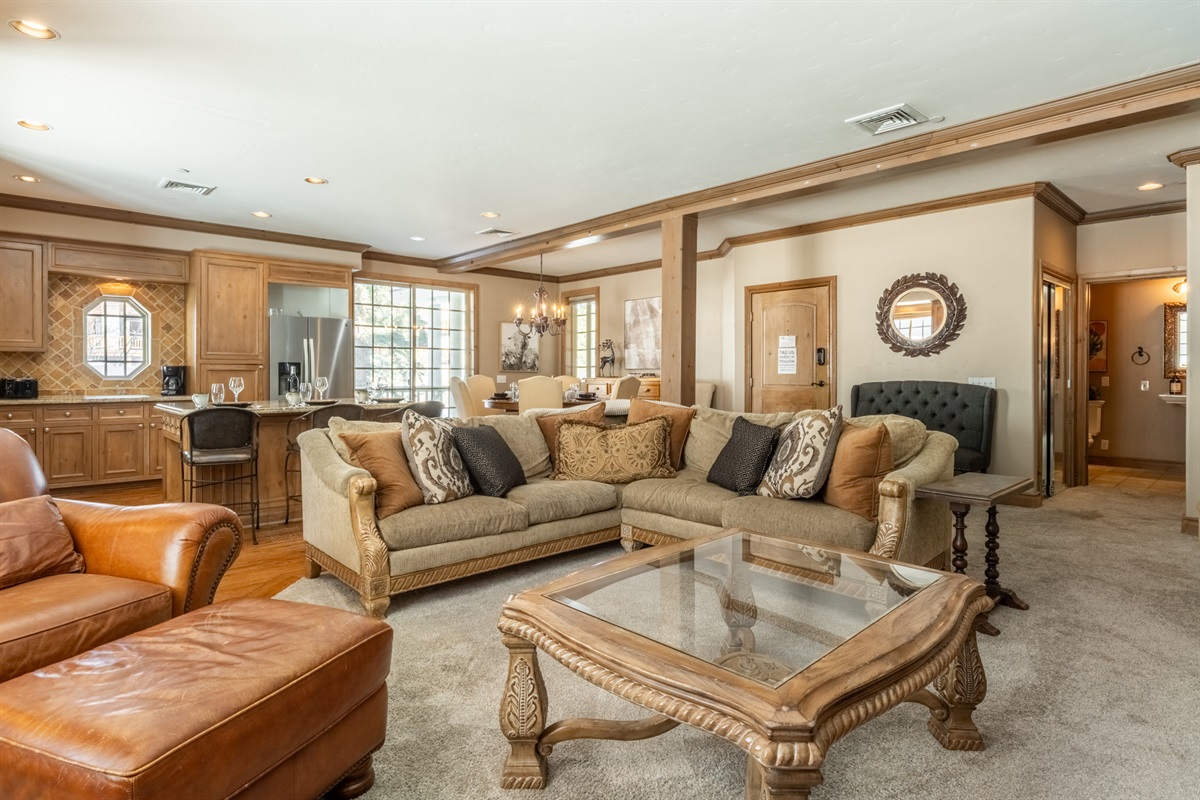 An open-concept layout connects the living and dining areas, making it easy to gather as a group while still offering room to spread out.