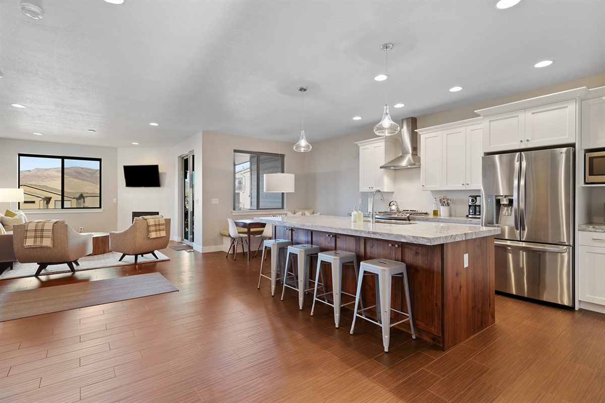 Expansive kitchen with bar seating for four guests—perfect for entertaining.