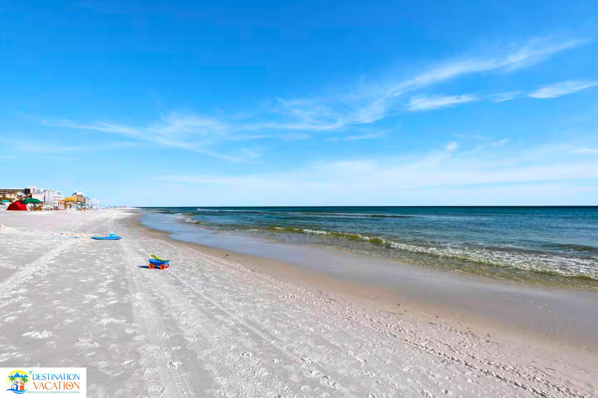 Pristine white sands stretch endlessly beneath brilliant skies.