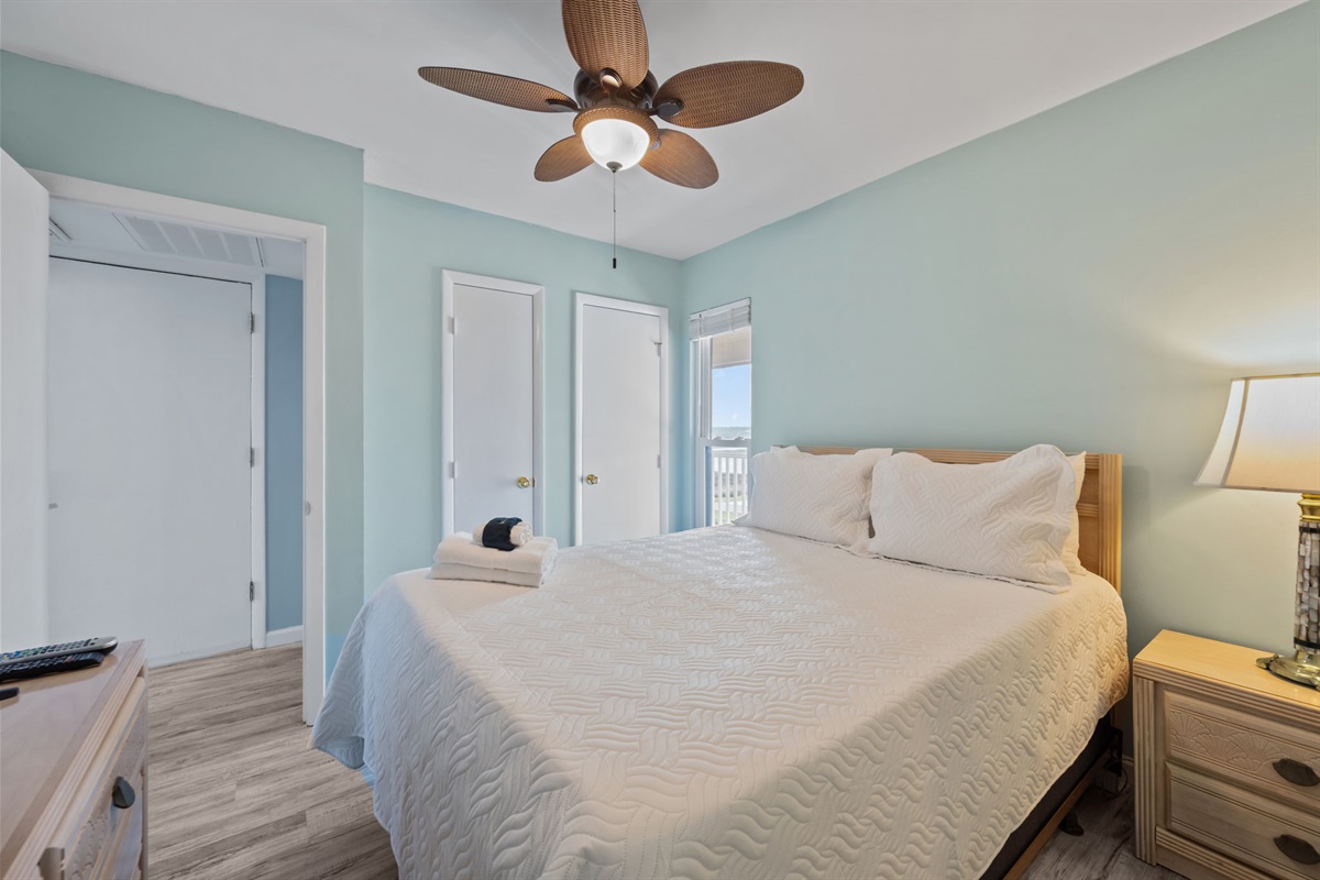 Spacious retreat with plush bedding and calming beach tones