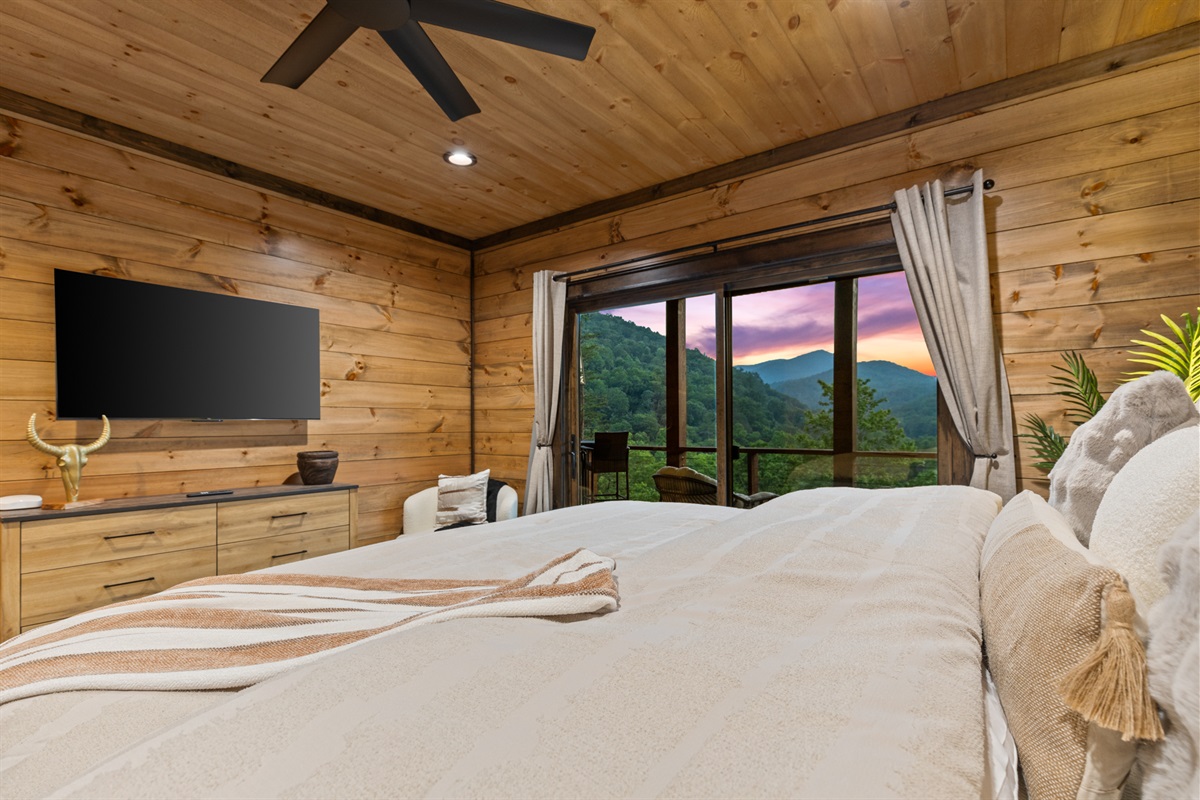 Wake to windows framed by trees and sky.