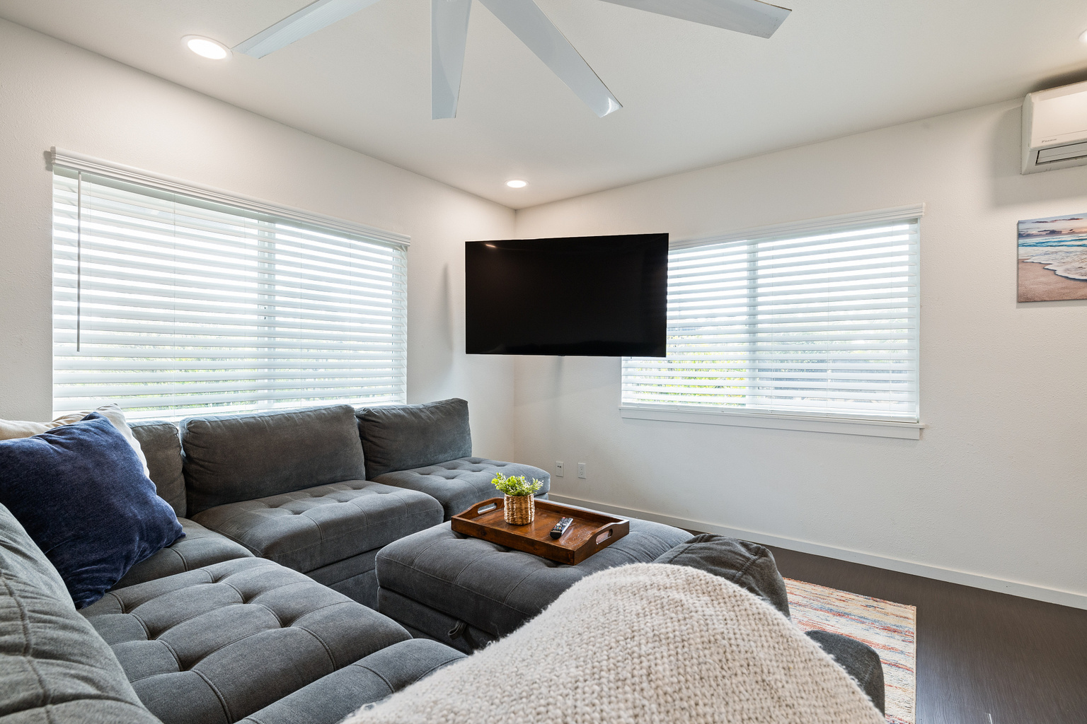 Air Conditioned Living Room | Representative Interior. Unit finishes, furnishings, and decor may vary.