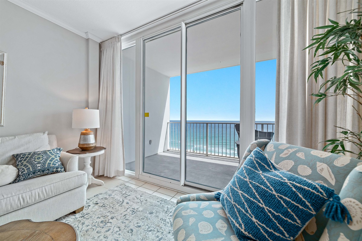 A tranquil corner in the living area offering the perfect spot to unwind and soak in the breathtaking ocean views. This cozy chair invites moments of peaceful contemplation.