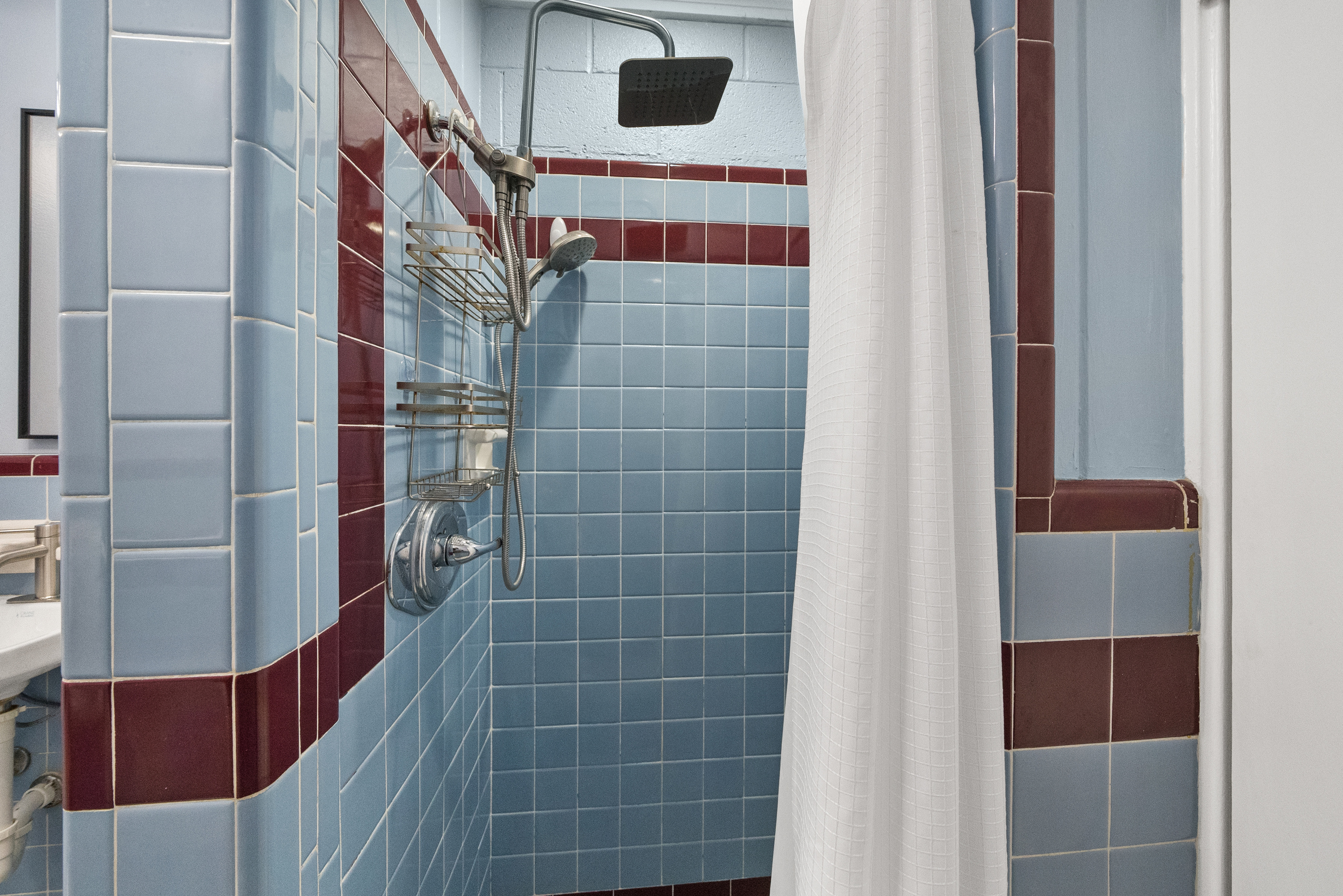 Bathroom #2, full bathroom — shower with rainfall and handheld heads