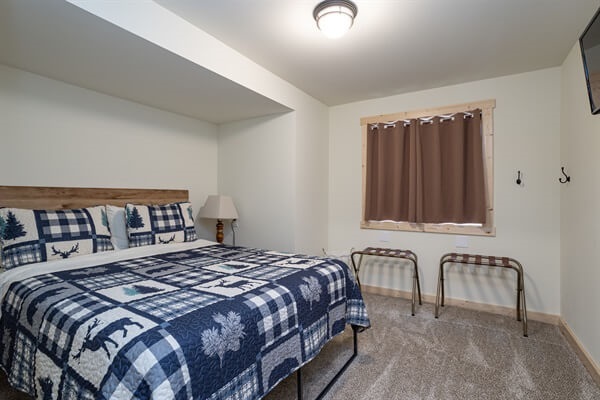 Bed 3 is the smallest room but still has plenty of space. It is located on the lower level near the stairway.