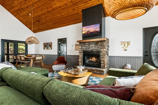 Evenings settle in here—fireplace glowing, a movie on, and everyone stretched out after a full day in the mountains.