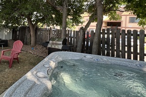 Our property is a true escape with a hot tub, firepit, outdoor seating, and a BBQ grill – the ultimate recipe for a perfect getaway!